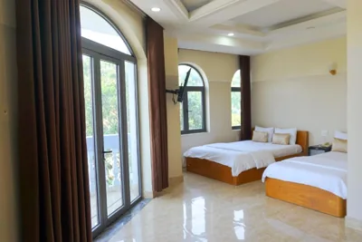 Chambre quadruple de luxe — Green Hotel Vĩnh Lộc
