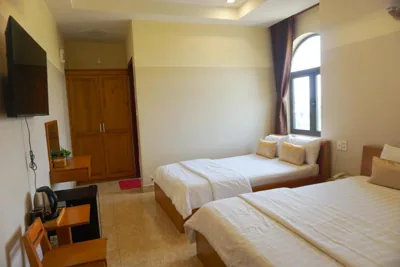 Chambre quadruple — Green Hotel Vĩnh Lộc